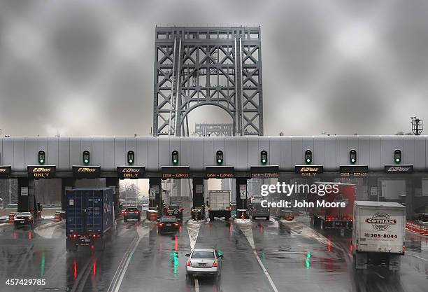 Vehicles slow for tolls before crossing the George Washington Bridge on December 17, 2013 in Ft. Lee, New Jersey. New Jersey's Republican Governor...