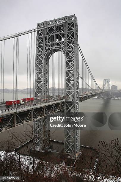 Traffic moves over the Hudson River and across the George Washington Bridge between New York City , and in Fort Lee, New Jersey on December 17, 2013....