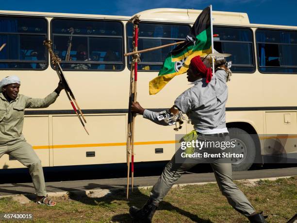 Traditionally dressed warrior dancers prepare to board buses to dance for the Nelson Mandela funeral dignitaries, Qunu, South Africa, 14 December...