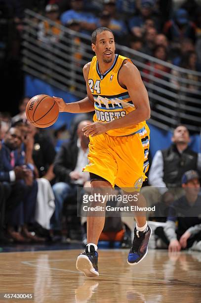 Andre Miller of the Denver Nuggets dribbles the ball against the Minnesota Timberwolves on November 15, 2013 at the Pepsi Center in Denver, Colorado....