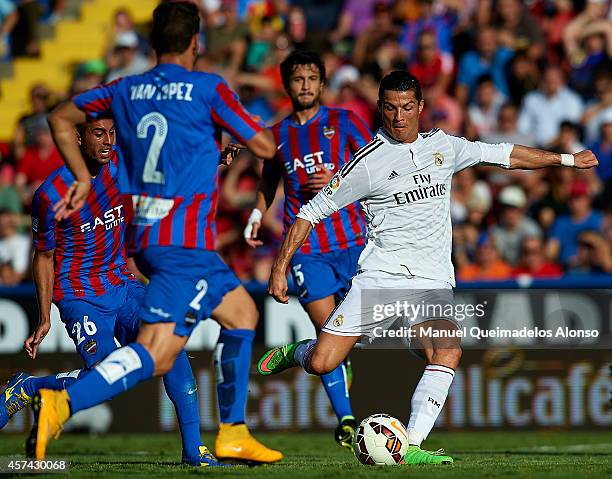 Cristiano Ronaldo of Real Madrid scores during the La Liga match between Levante UD and Real Madrid at Ciutat de Valencia on October 18, 2014 in...