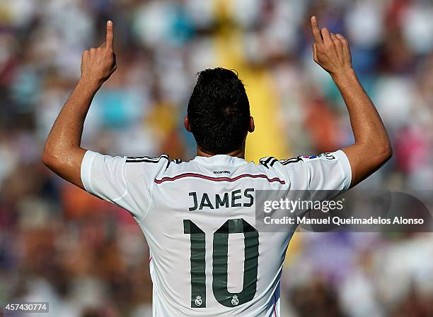 James Rodriguez of Real Madrid celebrates after scoring during the La Liga match between Levante UD and Real Madrid at Ciutat de Valencia on October...