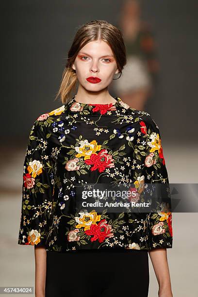 Model walks the runway at the Seyma Subasi show during Mercedes Benz Fashion Week Istanbul SS15 at Antrepo 3 on October 18, 2014 in Istanbul, Turkey.