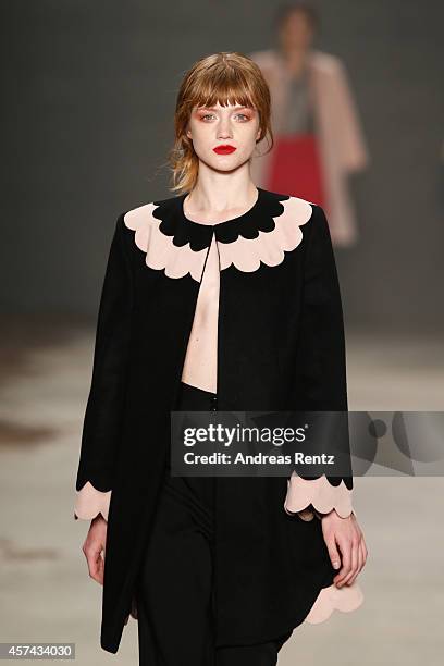 Model walks the runway at the Seyma Subasi show during Mercedes Benz Fashion Week Istanbul SS15 at Antrepo 3 on October 18, 2014 in Istanbul, Turkey.