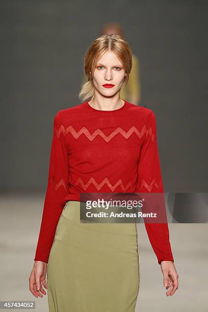Model walks the runway at the Seyma Subasi show during Mercedes Benz Fashion Week Istanbul SS15 at Antrepo 3 on October 18, 2014 in Istanbul, Turkey.