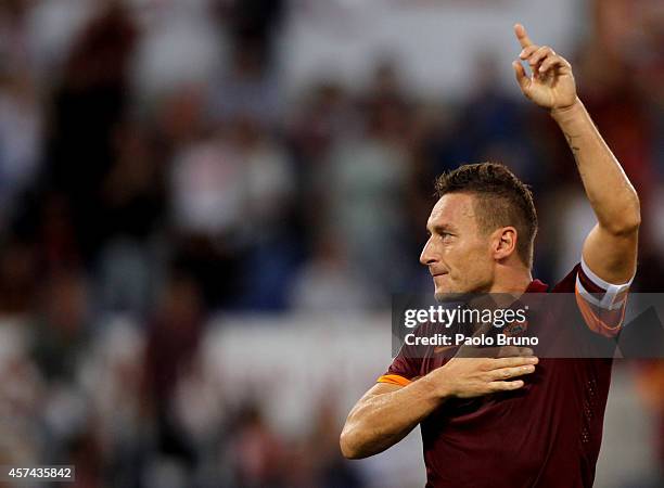 Francesco Totti of AS Roma celebrates after scoring the third team's goal from penalty spot during the Serie A match between AS Roma and AC Chievo...