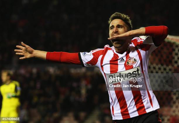 Fabio Borini of Sunderland celebrates as he scores their first goal during the Capital One Cup Quarter-Final match between Sunderland and Chelsea at...