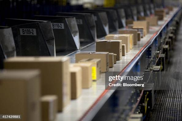 Fedex Parcel Loading Packages enter the loading area after being scanned at a FedEx Corp ...