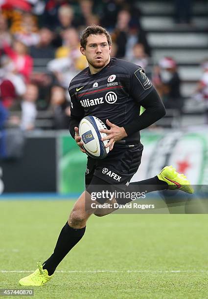 Alex Goode of Saracens runs with the ball during the European Rugby Champions Cup match between Saracens and ASM Clermont Auvergne at Allianz Park on...