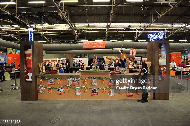 View of the bar station serving Blue Moon, Samuel Adams and Negra Modello beers at the Grand Tasting presented by ShopRite featuring KitchenAid®...