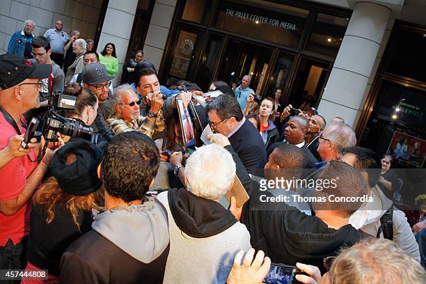 Fans gather to get autographs as Tom Selleck arrives at Paley Center For Media on October 18, 2014 in New York, New York.