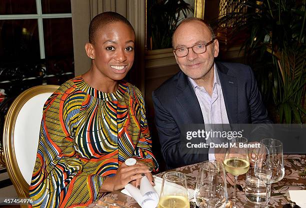 Erika Dalya Massaquoi and Edward Tyler Nahem attends the Sindika Dokolo Art Foundation dinner at Cafe Royal on October 18, 2014 in London, England.