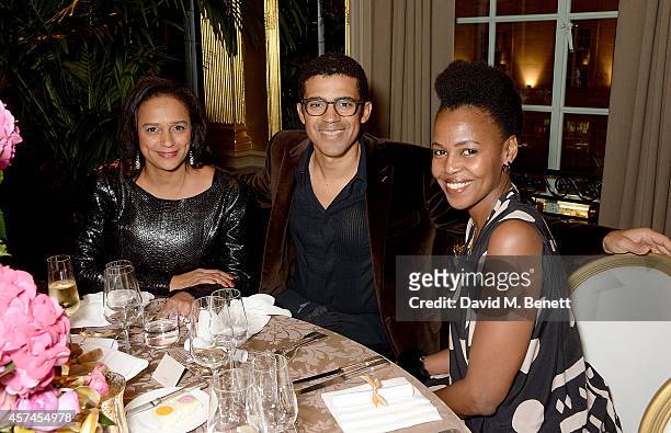 Isabel dos Santos, Sindika Dokolo and Wangechi Mutu attend the Sindika Dokolo Art Foundation dinner at Cafe Royal on October 18, 2014 in London,...