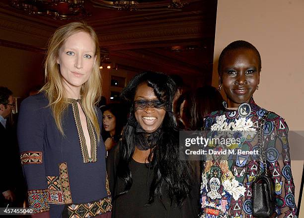 Jade Parfitt, Marcia Kure and Alex Wek attend the Sindika Dokolo Art Foundation dinner at Cafe Royal on October 18, 2014 in London, England.