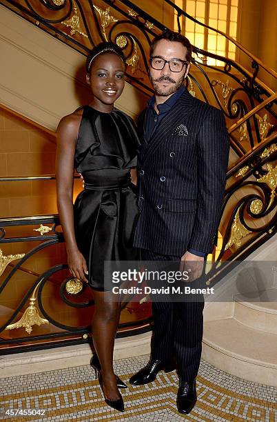 Lupita Nyong'o and Jeremy Piven attend the Sindika Dokolo Art Foundation dinner at Cafe Royal on October 18, 2014 in London, England.
