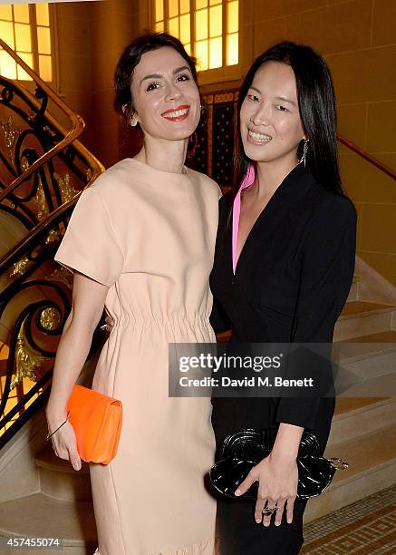 Lara Bohinc and Rosey Chan attend the Sindika Dokolo Art Foundation dinner at Cafe Royal on October 18, 2014 in London, England.