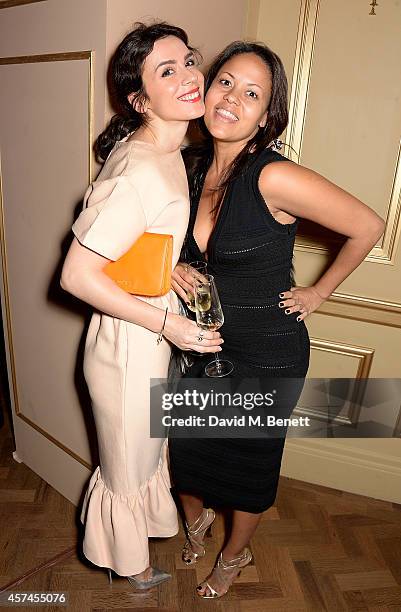 Lara Bohinc and Rachael Barrett attend the Sindika Dokolo Art Foundation dinner at Cafe Royal on October 18, 2014 in London, England.