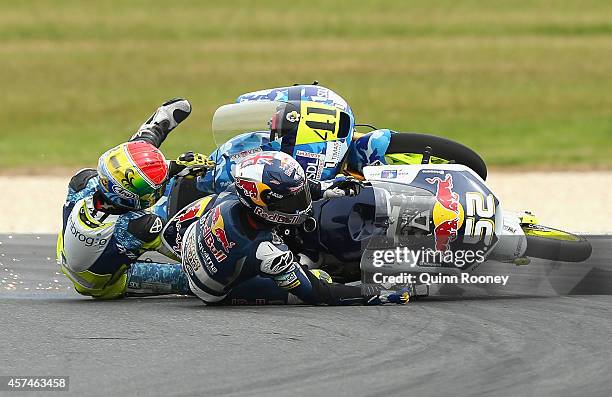 Brad Binder of South Africa and the Ambrogio Racing Mahindra and Danny Kent of Great Britain and the Red Bull Husqvarna AJO Husqvarna crash during...