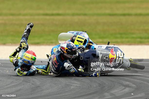 Brad Binder of South Africa and the Ambrogio Racing Mahindra and Danny Kent of Great Britain and the Red Bull Husqvarna AJO Husqvarna crash during...