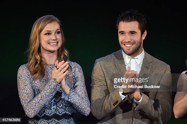 Actors Emily VanCamp and Joshua Bowman speak at the 24th Annual Environmental Media Awards presented by Toyota and Lexus at Warner Bros. Studio on...