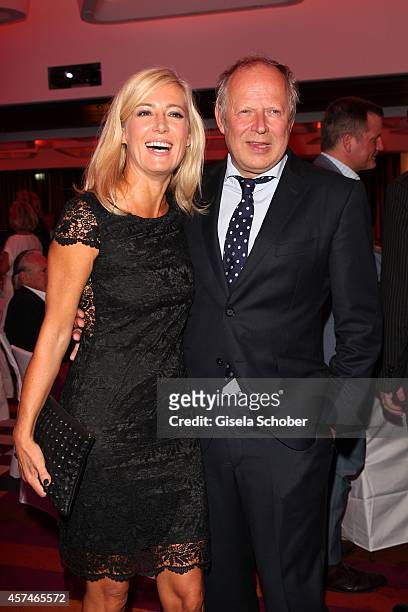 Axel Milberg and his wife Judith attend the Monti Memorial Charity Gala at Hotel Vier Jahreszeiten on October 18, 2014 in Munich, Germany.