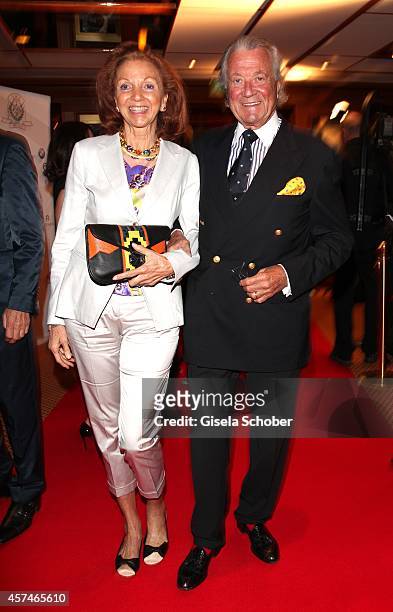 Toni Meggle and his wife Marina attend the Monti Memorial Charity Gala at Hotel Vier Jahreszeiten on October 18, 2014 in Munich, Germany.
