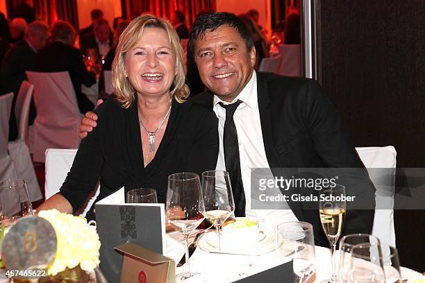 Sven Sturm and his wife Tamara attend the Monti Memorial Charity Gala at Hotel Vier Jahreszeiten on October 18, 2014 in Munich, Germany.