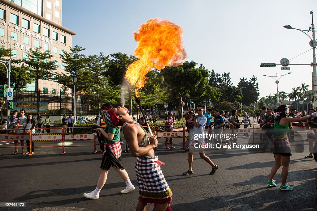 Breathing fire during a carnival. The Dream Parade is an...