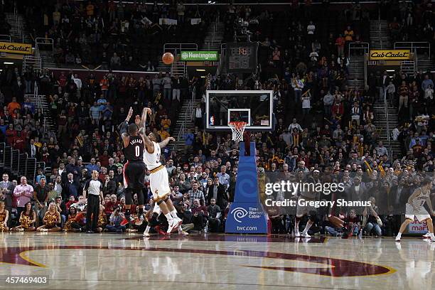 Damian Lillard of the Portland Trail Blazers hits the game winning three pointer against the Cleveland Cavaliers at The Quicken Loans Arena on...