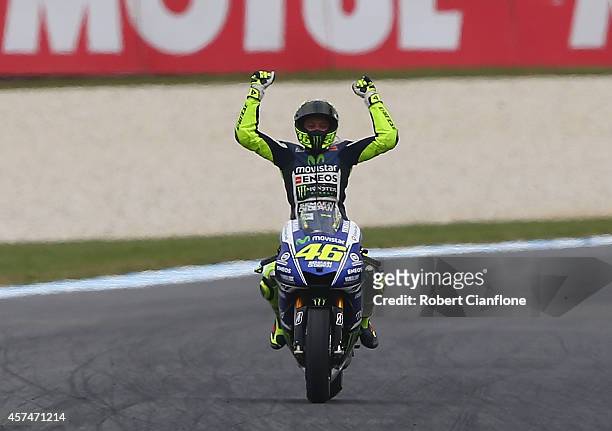 Valentino Rossi of Italy rider of the Movistar Yamaha MotoGp Yamaha celebrates after winning the 2014 MotoGP of Australia at Phillip Island Grand...