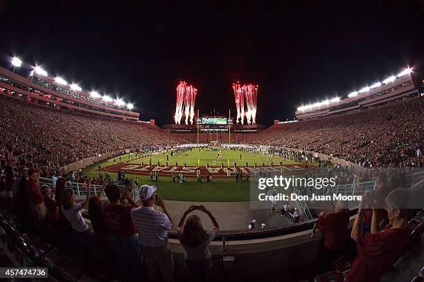 General view of Doak Campbell Stadium during some fireworks as the Florida State Seminoles enter the field to play the Notre Dame Fighting Irish at...