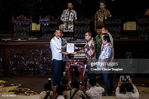 Indonesian President-elect Joko Widodo takes part in a inauguration rehearsal on October 19, 2014 in Jakarta, Indonesia. Joko Widodo will be...