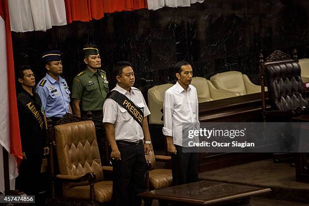 Indonesian President-elect Joko Widodo takes part in a inauguration rehearsal on October 19, 2014 in Jakarta, Indonesia. Joko Widodo will be...