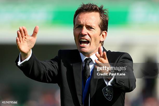 Mike Mulvey coach of the Roar signals to his players during the round two A-League match between the Perth Glory and Brisbane Roar at nib Stadium on...