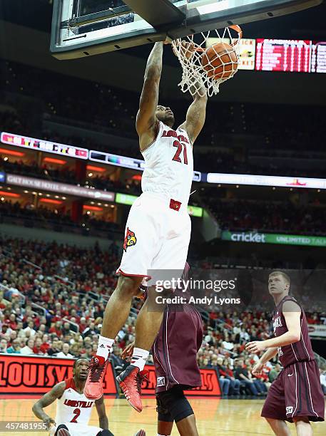 Chane Behanan of the Louisville Cardinals dunks the ball during the game against the Missouri State Bears at KFC YUM! Center on December 17, 2013 in...