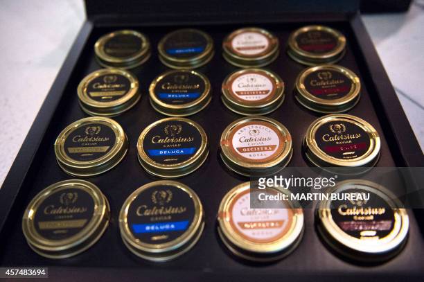 Different varieties of caviar from Italy are displayed at the SIAL , on October 19, 2014 in Villepinte, north-east of Paris. AFP PHOTO MARTIN BUREAU