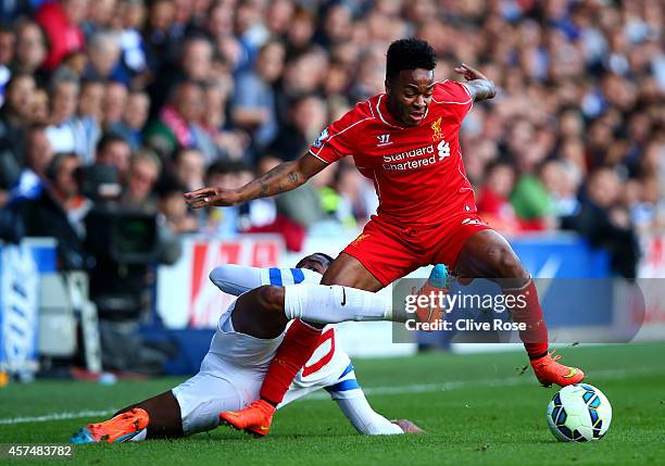 Raheem Sterling of Liverpool battles for the ball with Leroy Fer of QPR during the Barclays Premier League match between Queens Park Rangers and...