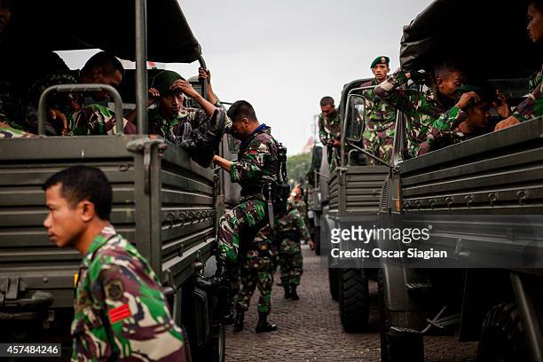 The Indonesian army are co-ordinated around the National Monument as they prepare for the inaguration of Indonesia President Joko Widodo on October...