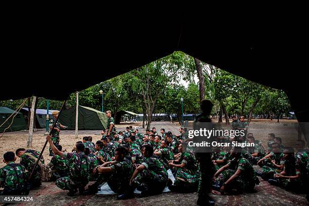 The Indonesian army are co-ordinated around the National Monument as they prepare for the inaguration of Indonesia President Joko Widodo on October...