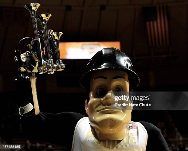 Purdue Pete raises a horn during a game between the Purdue Boilermakers and the Eastern Michigan Eagles on December 7, 2013 at Mackey Arena in West...