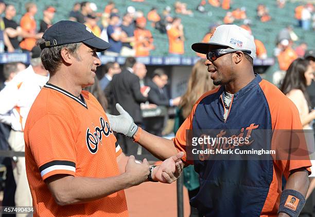 Mike Rowe, host of CNN's "Somebody's Gotta Do It," talks with Rajai Davis of the Detroit Tigers during batting practice prior to Game Two of the...
