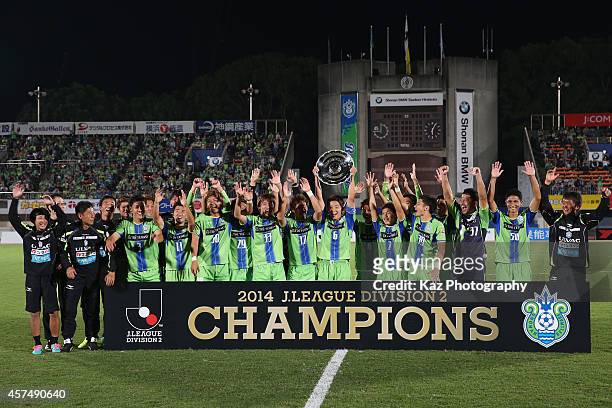 Shonan Bellmare players and staffs celebrate winning the J.League second division after the J.League second division match between Shonan Bellmare...