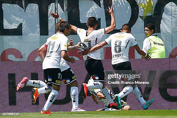 Esteban Paredes of Colo-Colo celebrates after scoring the opening goal against U de Chile during a match between Colo-Colo and U de Chile as a part...