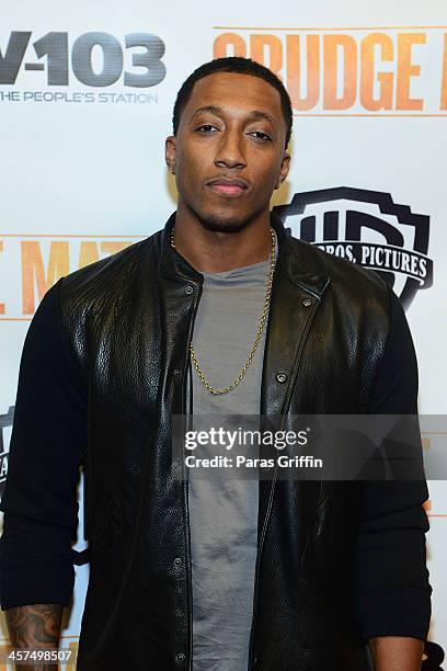 Recording artist Lecrae attends the "Grudge Match" screening at AMC Parkway Pointe on December 17, 2013 in Atlanta, Georgia.