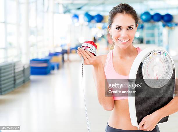 woman living a healthy lifestyle - kilogram stock pictures, royalty-free photos & images