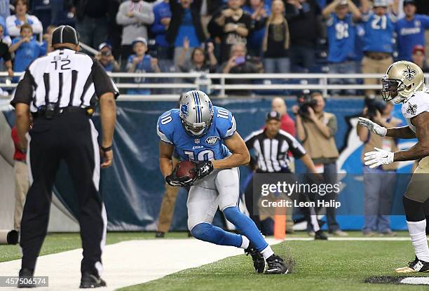 Corey Fuller of the Detroit Lions scores a late fourth quarter touchdown during the game against the New Orleans Saints at Ford Field on October 19,...