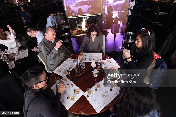 Guests attend the Chocolate And Whiskey Pairing With Tache Artisan Chocolate during Food Network New York City Wine & Food Festival Presented By FOOD...