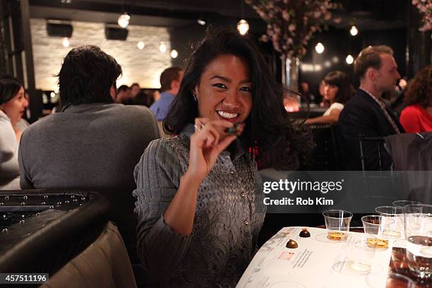 Guests attend the Chocolate And Whiskey Pairing With Tache Artisan Chocolate during Food Network New York City Wine & Food Festival Presented By FOOD...