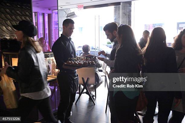 Guests attend the Chocolate And Whiskey Pairing With Tache Artisan Chocolate during Food Network New York City Wine & Food Festival Presented By FOOD...