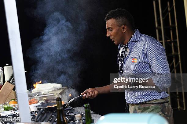 Chef Marcus Samuelsson gives a cooking demonstration at the Grand Tasting presented by ShopRite featuring KitchenAid® culinary demonstrations...